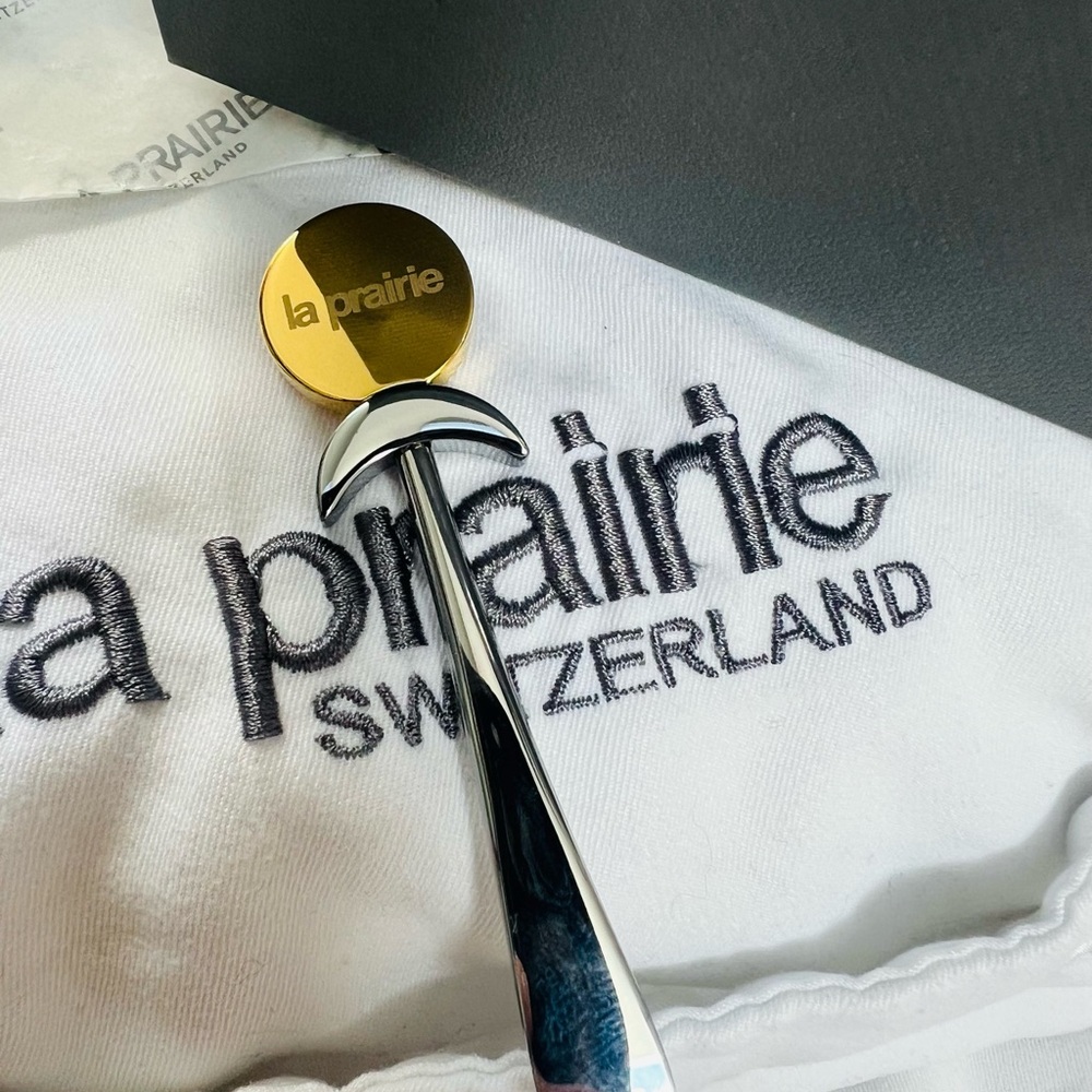 La Prairie Gold and Silver Skincare Tool